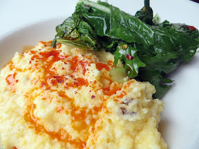 Accanto PDX, Creamy polenta with garlicky braised greens, poached eggs and chili oil