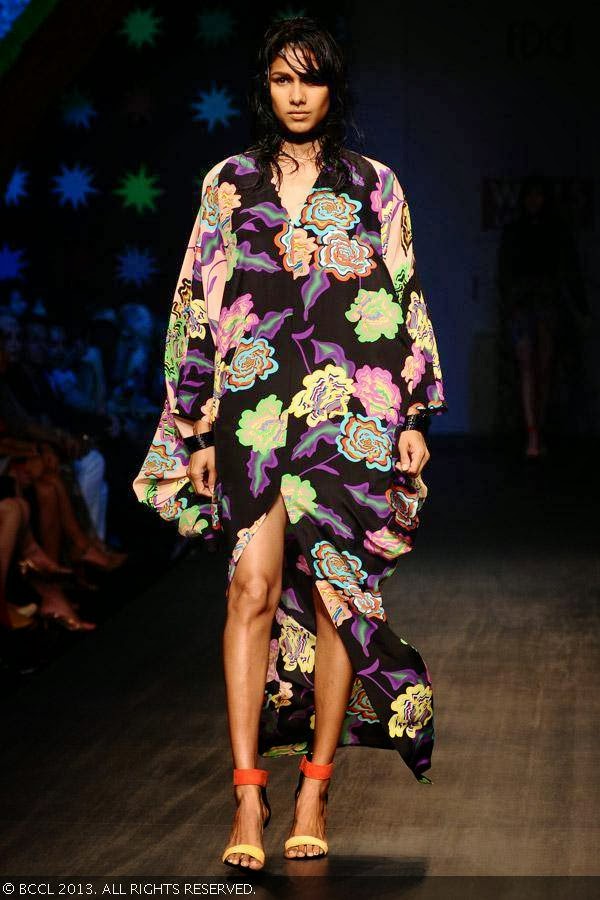 Nethra showcases a creation by designer duo Anna Plunkett and Luke Sales on Day 1 of Wills Lifestyle India Fashion Week (WIFW) Spring/Summer 2014, held in Delhi.