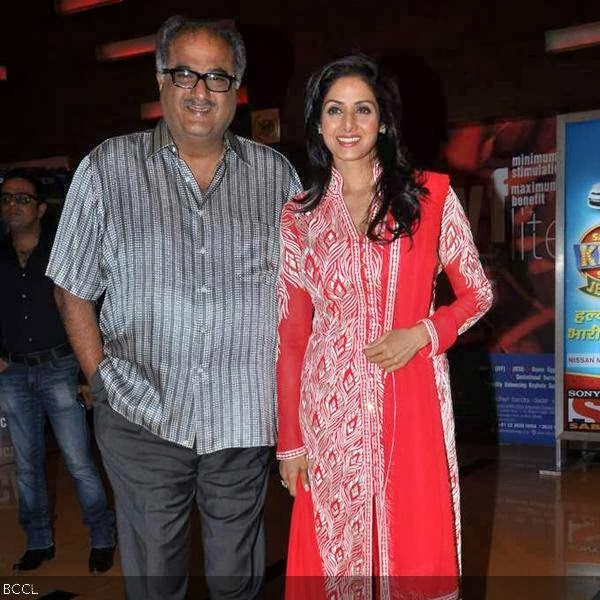 Boney Kapoor and Sridevi pose for the flashbulbs during the premiere of Bengali movie Mishawr Rahasya, held at Cinemax, in Mumbai, on October 9, 2013. (Pic: Viral Bhayani)