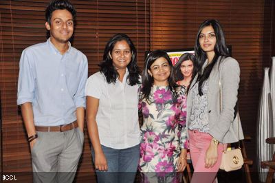 Diana Penty poses with guests during the unveiling of a health magazine latest issue in Mumbai on January 28, 2013. (Pic: Viral Bhayani)