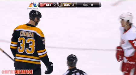 Zdeno Chara roughing up Brendan Smith