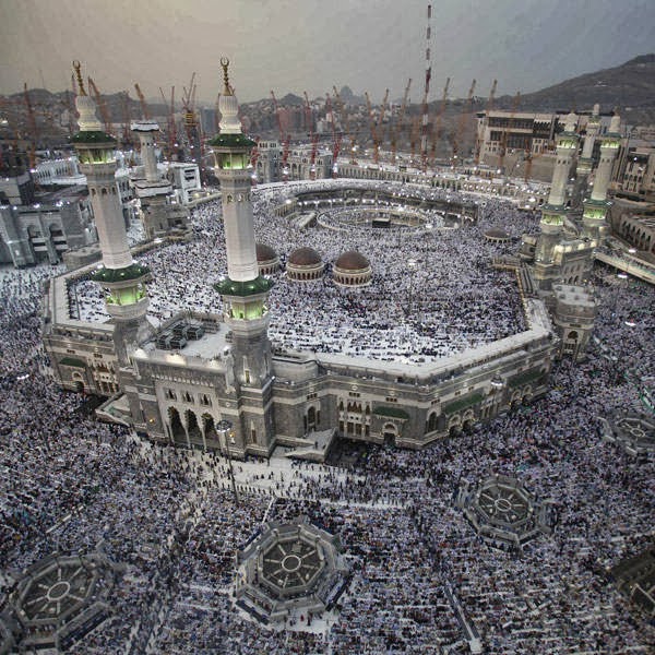 Muslim pilgrims pray at the Grand mosque in the holy city of Mecca, ahead of the annual haj pilgrimage October 10, 2013.
