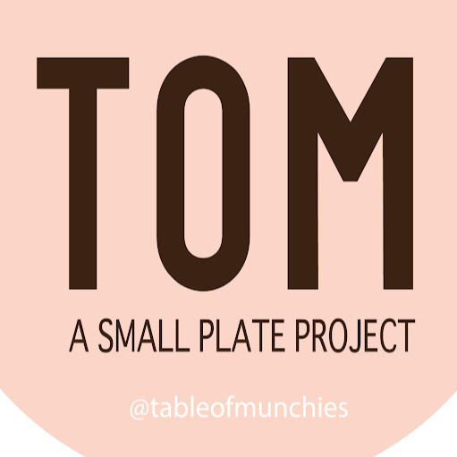 Table of Munchies (TOM) logo