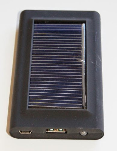  SunPlug Solar Charger for Cell Phones with an LED light. Pocket Size, unique design. 0.55 watt solar panel, 2000 mAh rechargable battery.