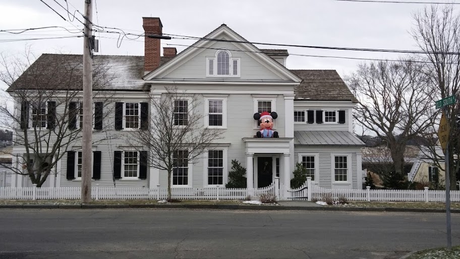 Mickey Mouse on top of a house!