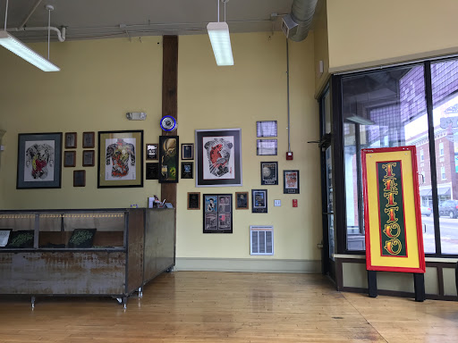 Tattoo Shop «Mos Eisleys», reviews and photos, 71 Division Ave S, Grand Rapids, MI 49503, USA