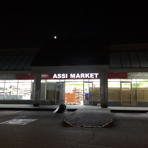 Assi Market Coquitlam logo