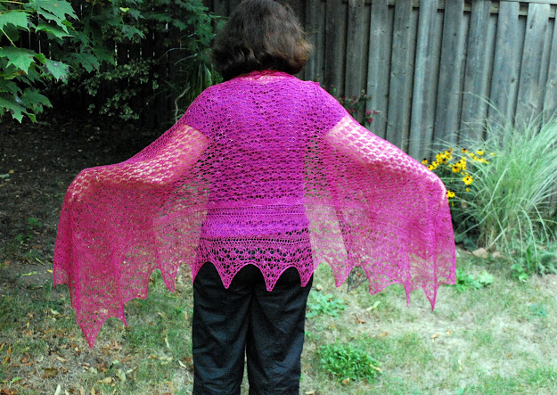 Lace stole hand knit in spider pattern