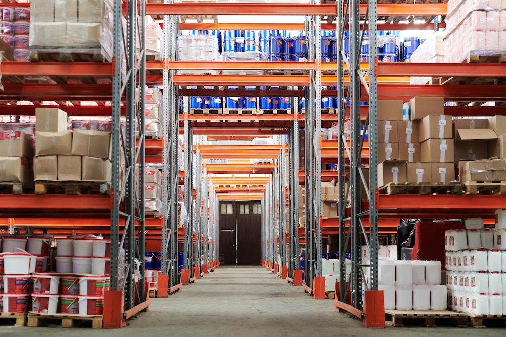 warehouse racks with goods stacked on shelves