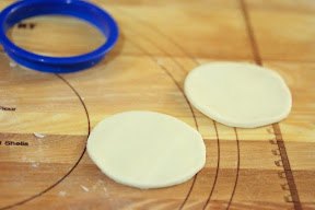 photo showing two circles of dough
