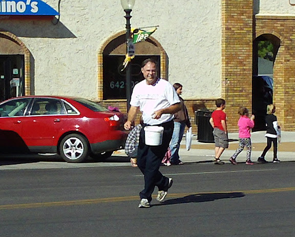 Public Utilities Commissioner Chris Nelson campaigns at Swarm Days Parade, September 22, 2012
