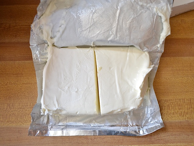 cream cheese block cut in half 