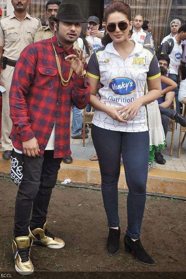 Yo Yo Honey Singh and Huma Qureshi strike a pose during the Celebrity Cricket League 2014, held at the DY Patil Stadium, in Mumbai, on January 25, 2014. (pic: Viral Bhayani)