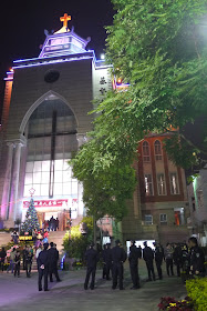 church with police standing outside in Quanzhou, China