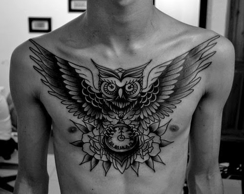 best owl tattoo on his chest