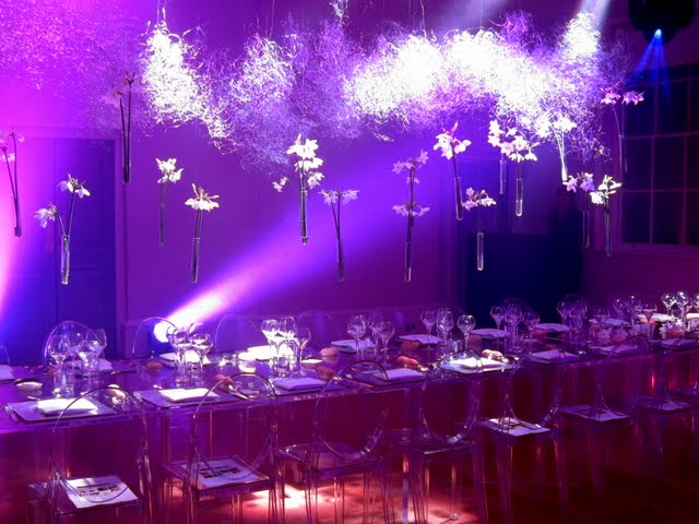 Table in violet light at a molecular gastronomy dinner at Somerset House on the Strand in London England