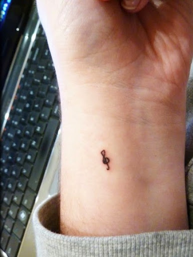Music small tattoos on the wrist