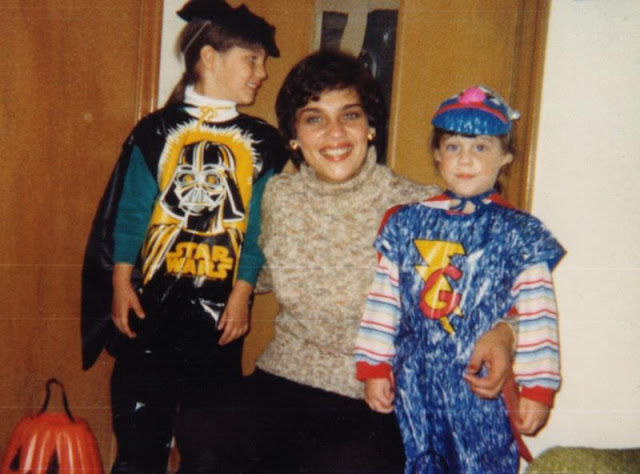 Me as Darth Vader, my sis at Super Grover.