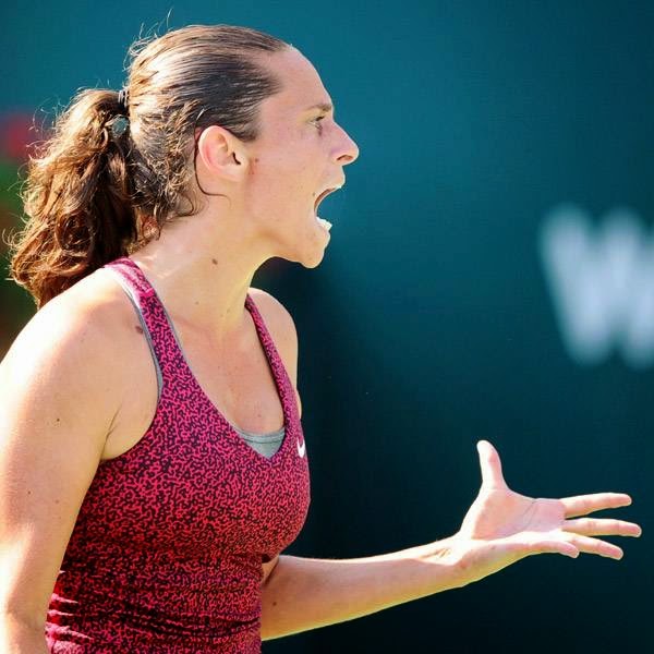 Italy's Roberta Vinci reacts during a WTA Istanbul Cup final tennis match against Denmark's Caroline Wozniacki on July 20, 2014 in Istanbul. 