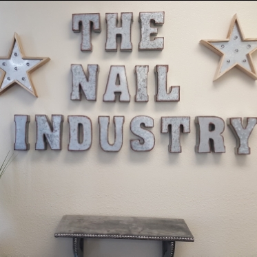 The Nail Industry logo