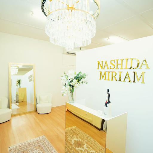 Nashida Miriam logo