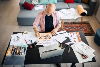 Calligraphy senior artist in his home office