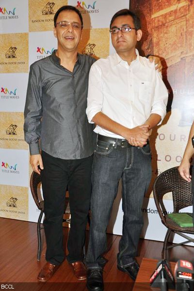 Vidhu Vinod Chopra in company of author Rahul Pandita during the launch of the latter's book 'Our Moon Has Blood Clots', held at Title Waves Book Store in Mumbai on February 4, 2013. (Pic: Viral Bhayani)