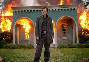 The Governor (David Morrissey) burning down Woodbury, in episode 6. Photo by Gene Page/AMC.