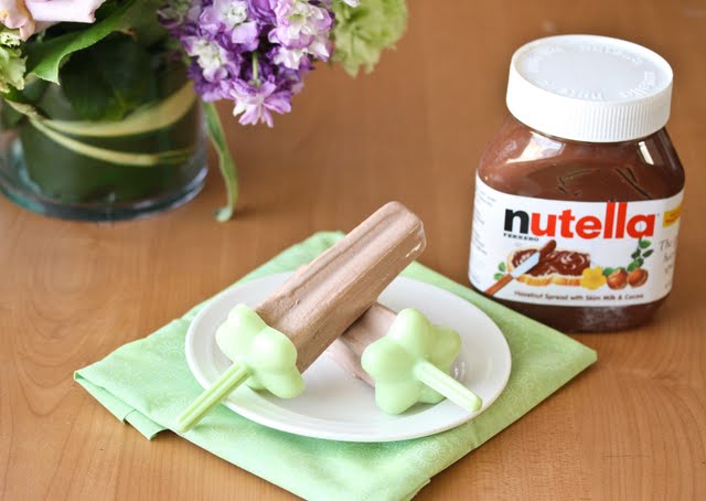 photo of Nutella fudgsicles on a plate with a jar of Nutella