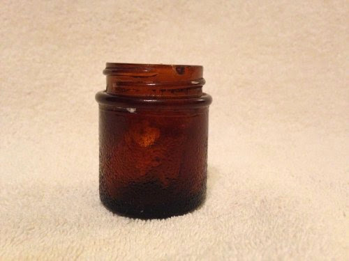  old brown Brockway medicine jar, still has medicine inside