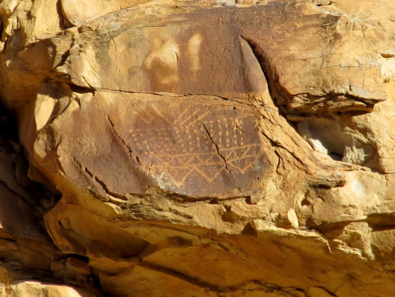 Petroglyphs high above the road