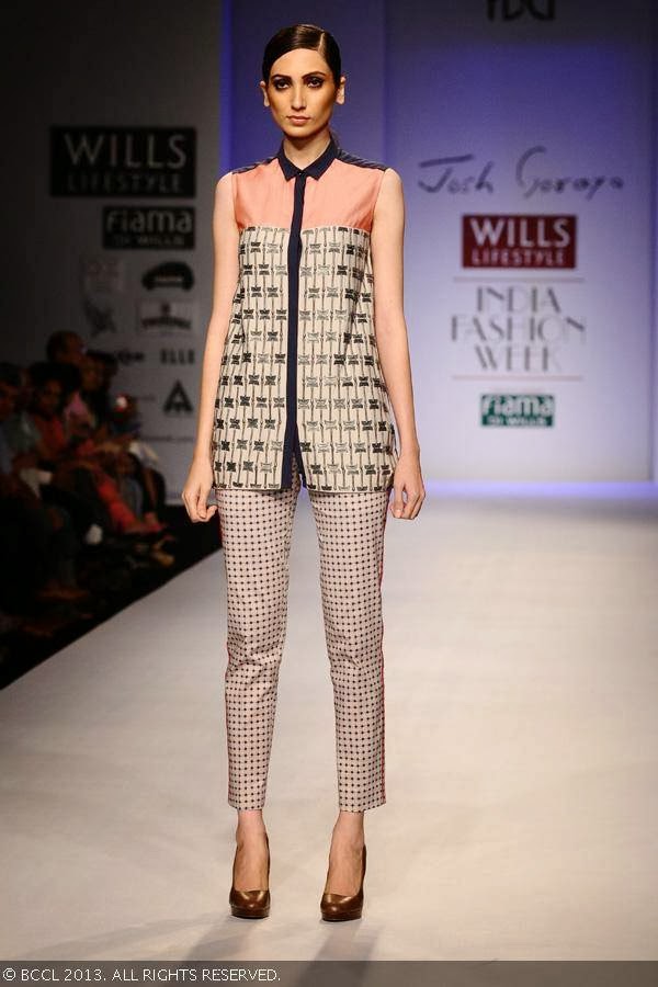 Lekha displays a creation by fashion designer Josh Goraya on Day 5 of Wills Lifestyle India Fashion Week (WIFW) Spring/Summer 2014, held in Delhi.<br /> <br /> 