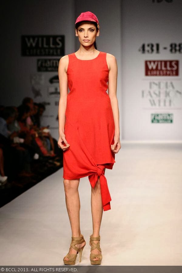 Indrani showcases a creation by fashion designer Shweta Kapur on Day 5 of Wills Lifestyle India Fashion Week (WIFW) Spring/Summer 2014, held in Delhi.<br /> <br /> 