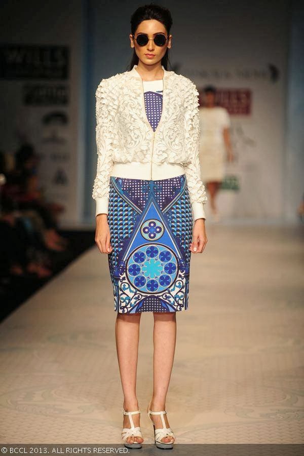 Marcela showcases a creation by designer duo Pankaj and Nidhi on Day 2 of the Wills Lifestyle India Fashion Week (WIFW) Spring/Summer 2014, held in Delhi.