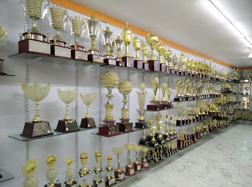 Olympic Sporting Co, Near Tribhuvan Theatre 1st Cross, Gandhinagar, Bengaluru, Karnataka 560009, India, Trophy_Shop, state KA