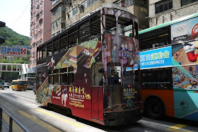 Hong Kong tram with Hong Kong Museum of Art advertisement