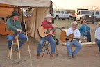 Dan Roberts, Red Steagall, and Dick De Guerin perform at the wagon on family night
