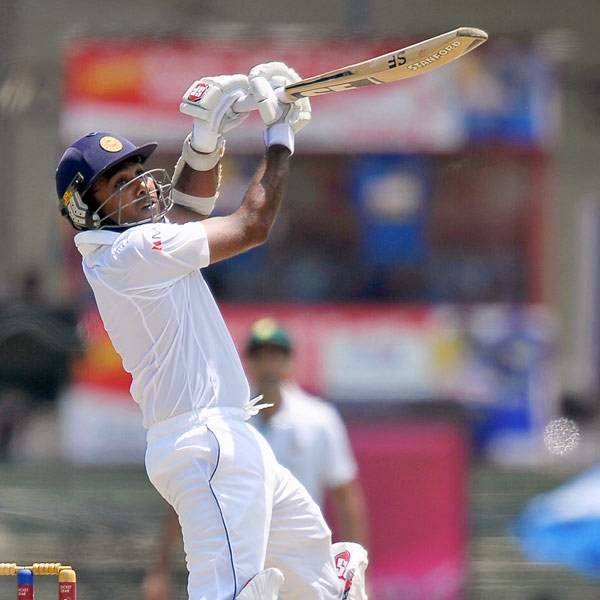 Sri Lankan batsman Mahela Jayawardene plays a shot during the opening day of the second Test match between Sri Lanka and South Africa at the Sinhalese Sports Club (SSC) Ground in Colombo on July 24, 2014. 
