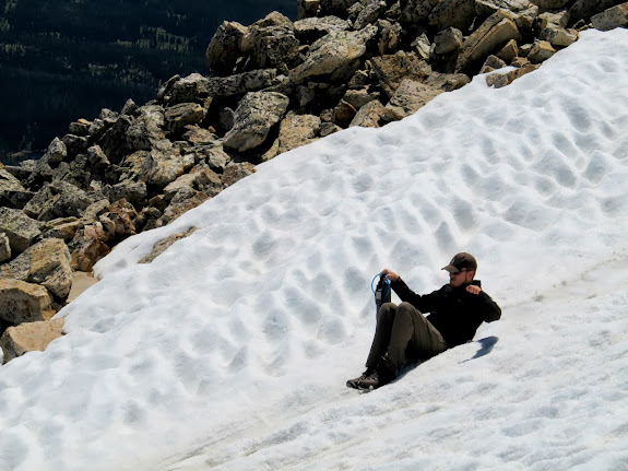 Chris glissading down the ridge