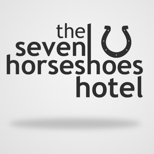 The Seven Horseshoes logo