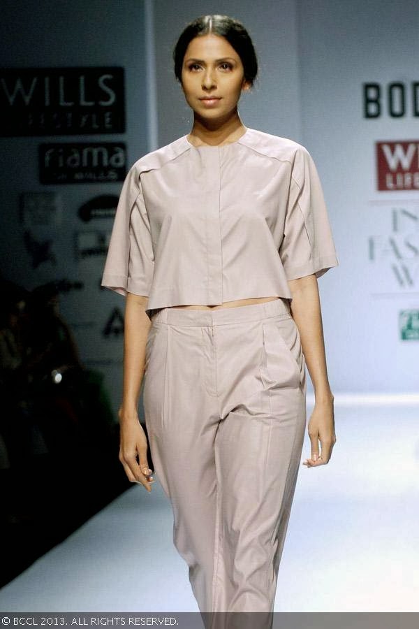 Candice Pinto flaunts a creation by fashion designer Ruchika Sachdev on Day 3 of Wills Lifestyle India Fashion Week (WIFW) Spring/Summer 2014, held in Delhi.
