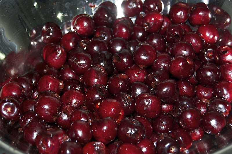 fresh pitted cherries in a bowl