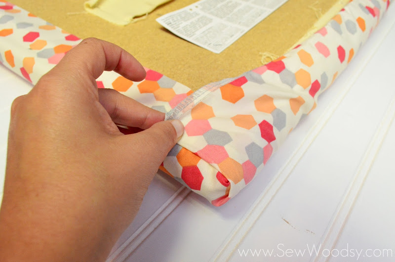 How to Reupholster a Rocking Ottoman with a Pillowcase from SewWoodsy.com #nursery #diy #reupholster