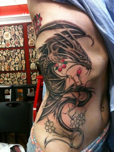 dragon tattoos on chest and ribcage 