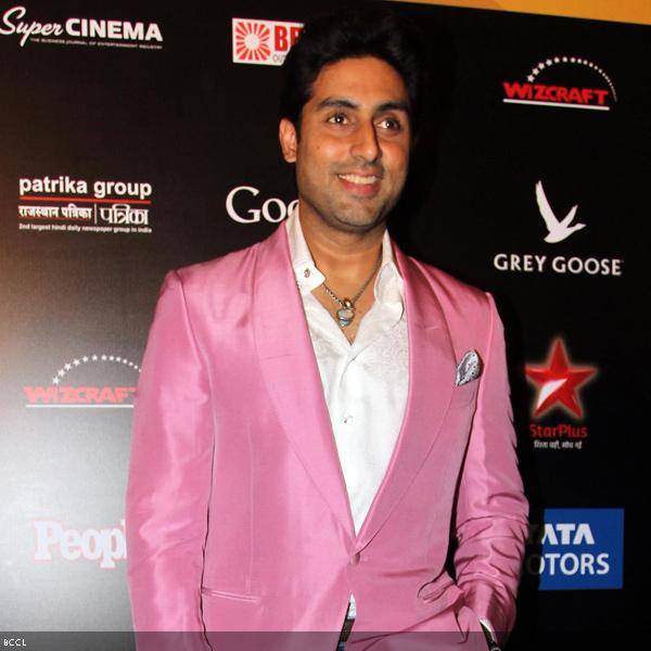 Abhishek Bachchan looks handsome in pink blazer during the14th International Indian Film Academy (IIFA) 2013 Rocks event, held at The Venetian hotel in Macau, on July 5, 2013. (Pic: Viral Bhayani)