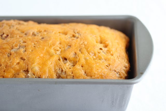 close up photo of beer bread in a loaf pan