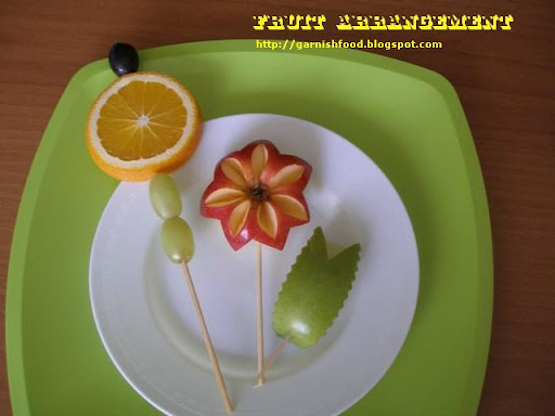 Fruit Carving Arrangements and watermelon carving for baby shower. Fruit Carving Arrangements and