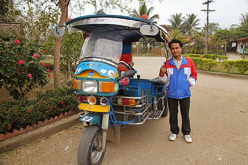 laotian tuk-tuk, getting around in Laos, taking the bus in laos