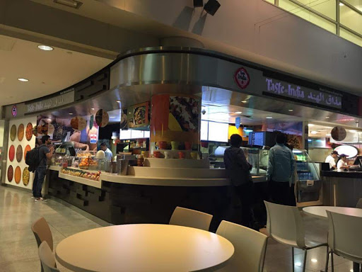 Taste of India Restaurant, Food Court, Near Gate C13 & C15, Departures، Terminal 1, Area، Dubai International Airport - Parking B، Airport Road - Dubai - United Arab Emirates, Indian Restaurant, state Dubai