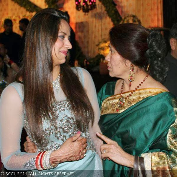 Ahana Deol interacts with her relative during her wedding reception party, held at Vohra Farmhouse, New Delhi. Ahana Deol interacts with her relative during her wedding reception party, held at Vohra Farmhouse, New Delhi.